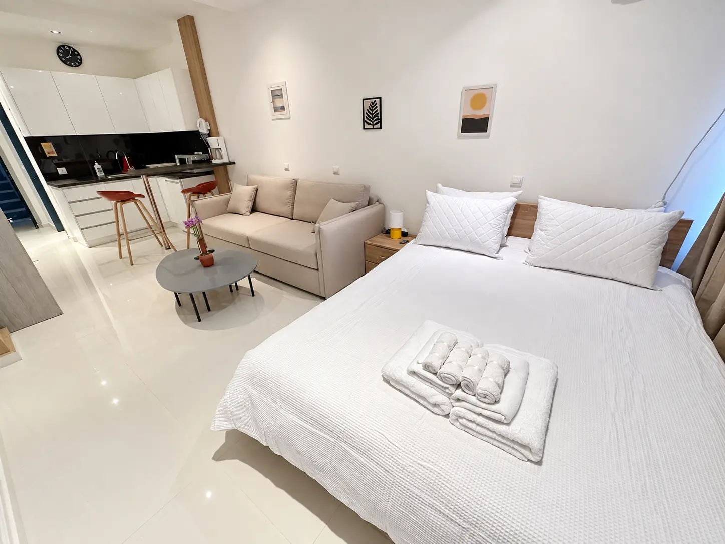 Open-plan furnished apartment with kitchen