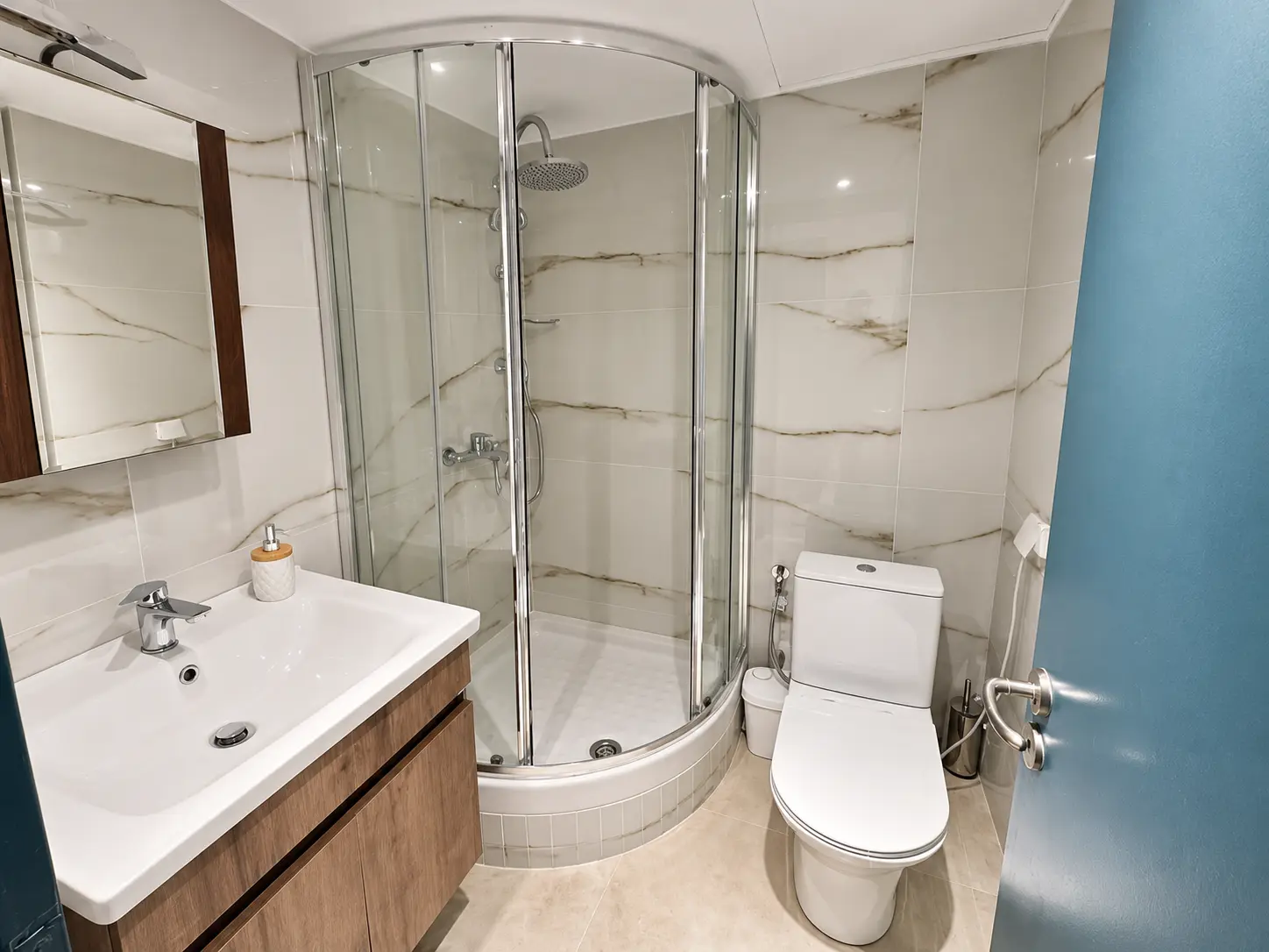 Bathroom with enclosed shower